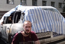 Сгоревшие в Донецке машины ОБСЕ